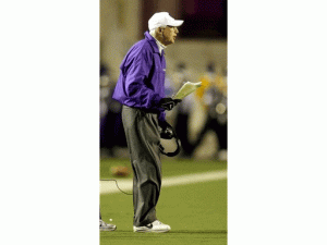 (AP) Kansas State Football Coach Bill Snyder coaches players from the sideline during KSU's 62-14 victory of over Texas AM